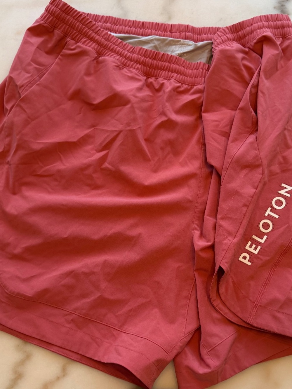 Peloton / 38" / Light Pink / Polyester 7" Gym Short w/ liner (Never Worn)